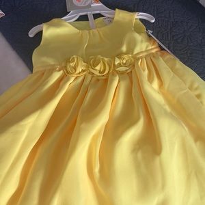Yellow dress.  Some discoloration in flowers. Nwt